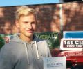 Marcin with Driving test pass certificate